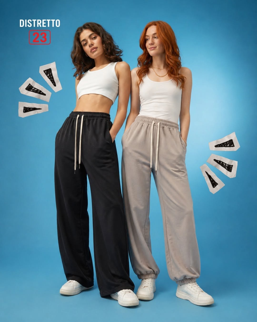 Due modelle in pantaloni wide-leg neri e jogger grigi, top bianchi, sneaker su fondo azzurro, logo Distretto 23